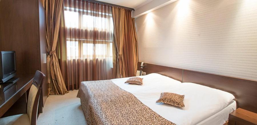 Spa Hotel Persenk Dewin Zimmer foto A bedroom at the hotel